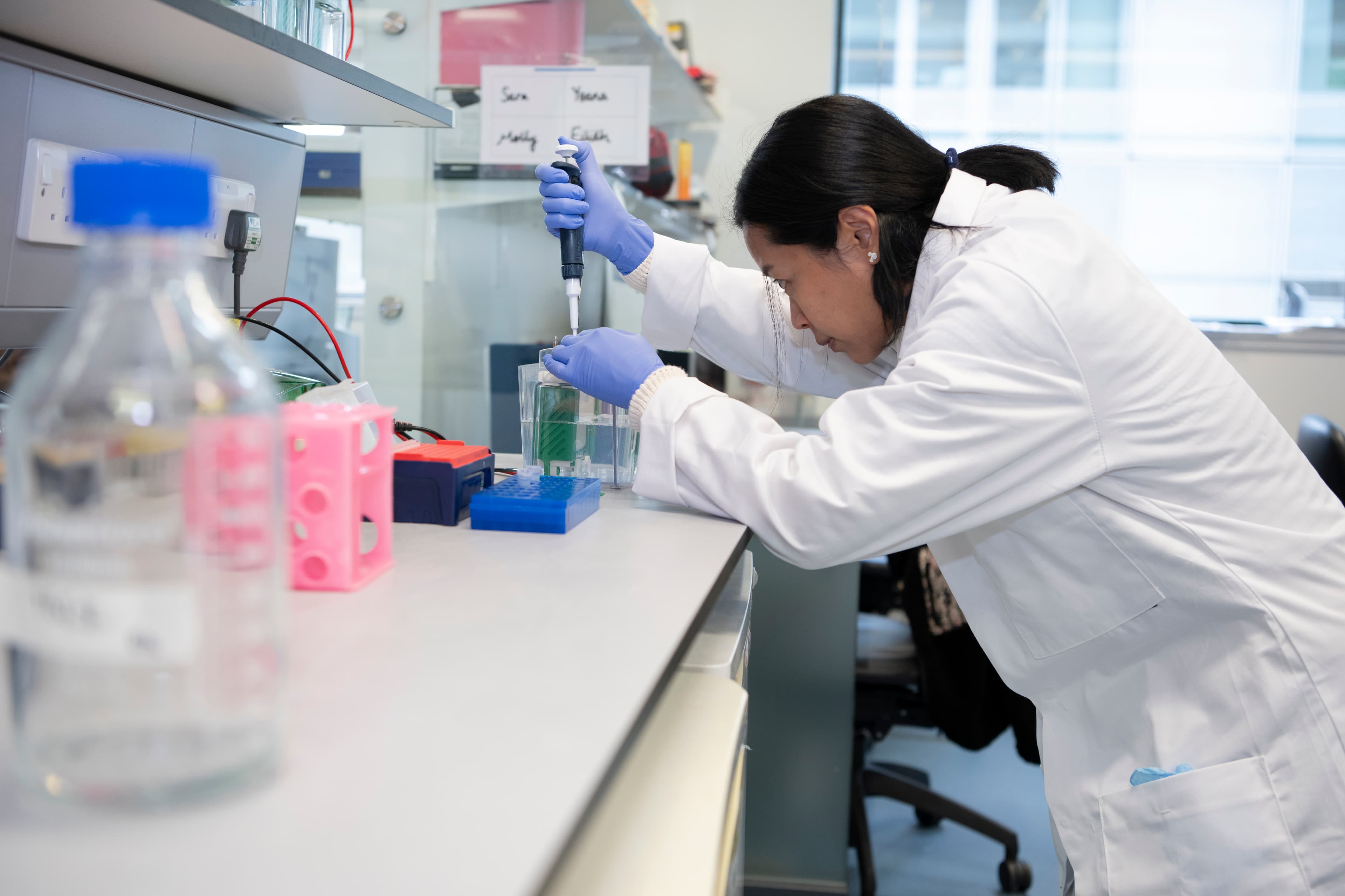 A photo of a scientist working in a lab.