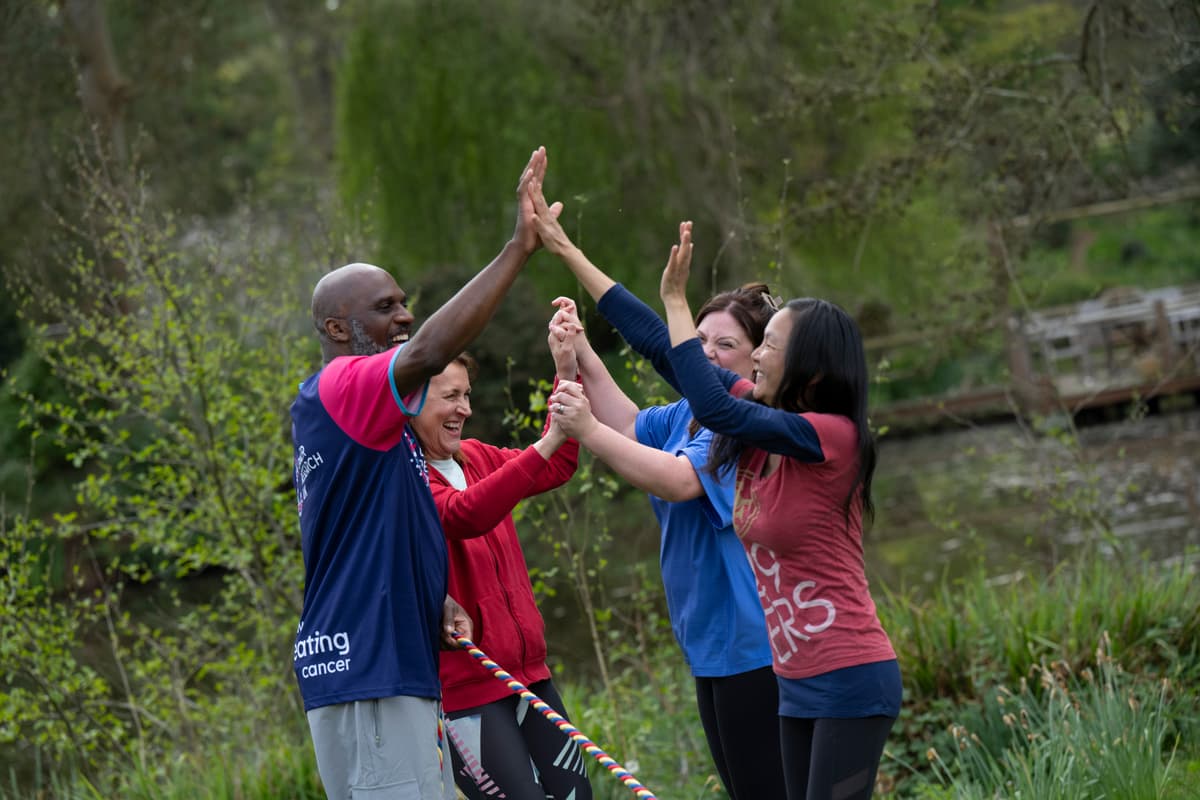 A photo of two Cancer Research UK fundraisers.