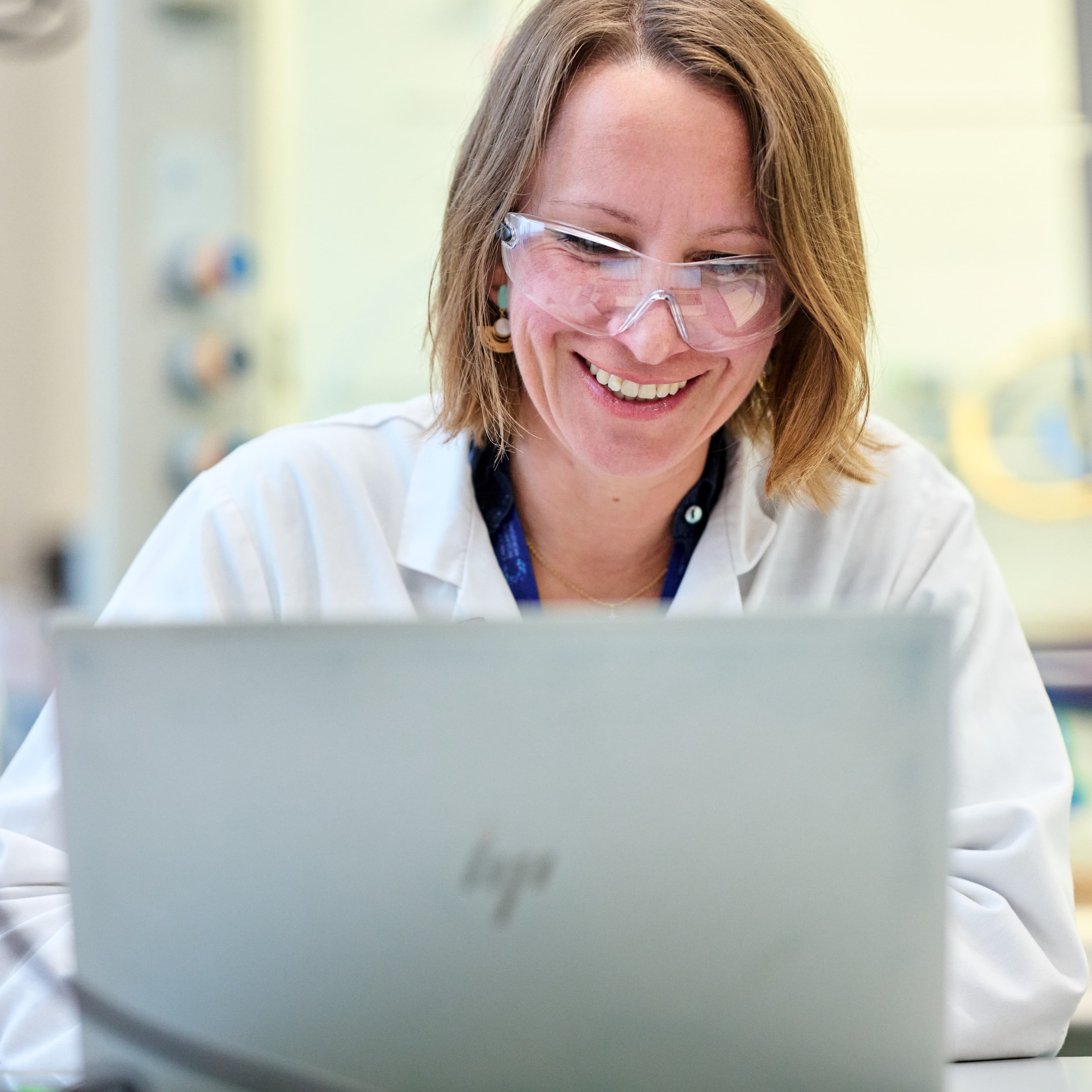 Person in front of a laptop.