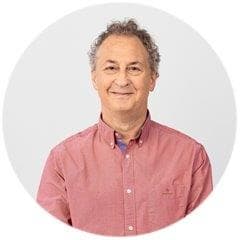 Headshot of CRUK Trustee Gerard Evan.