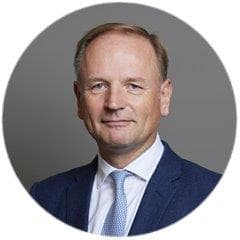 Headshot of CRUK Trustee Lord Simon Stevens.