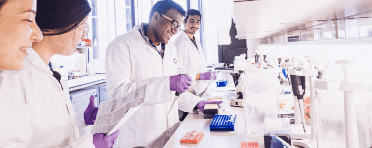Group of researchers working together in a lab.