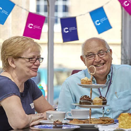 A man and woman at a legacy event.