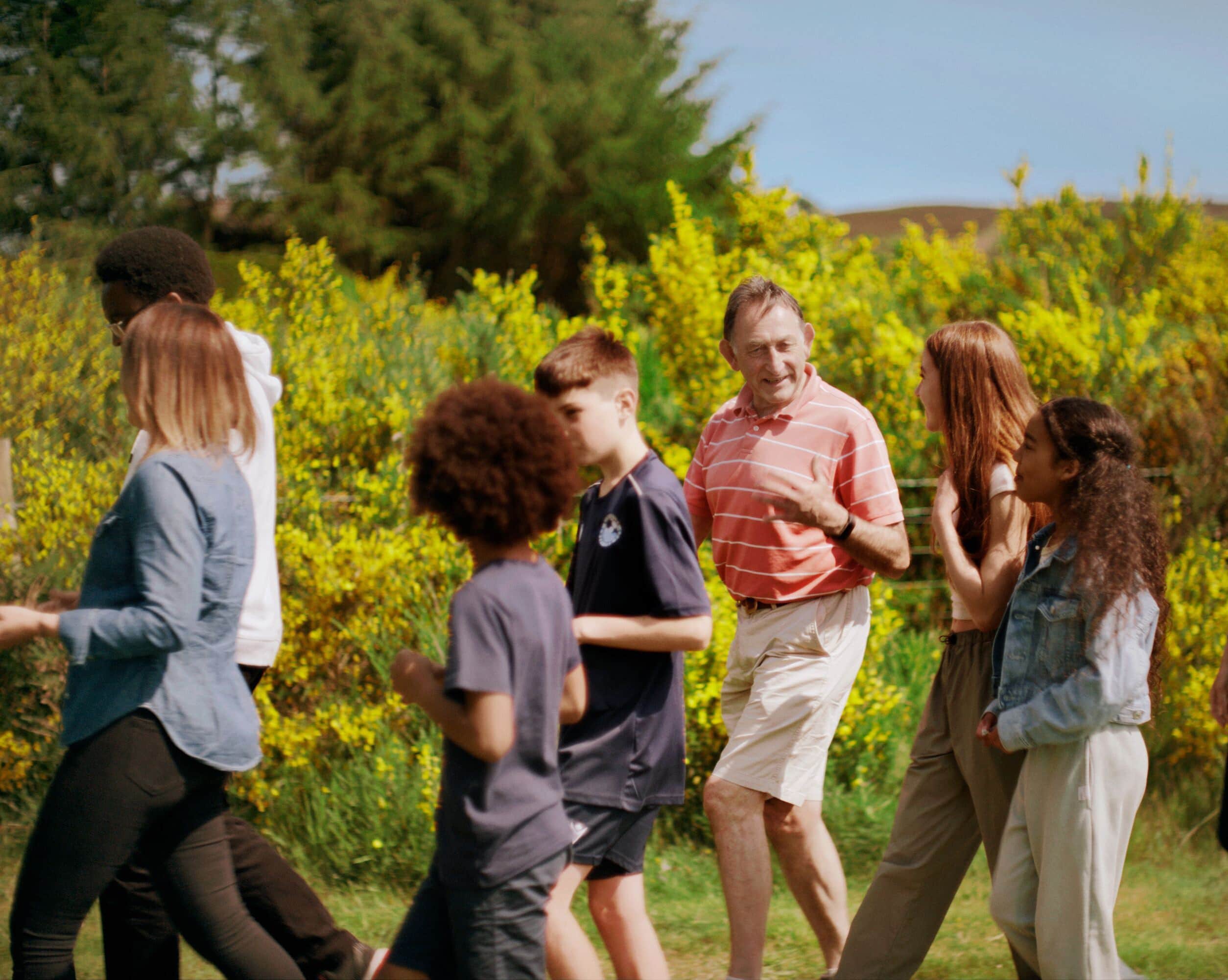 Media volunteer, Jo walking with his family. He is a Pledger for Cancer Research UK.
