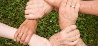 Hands joining in a circle