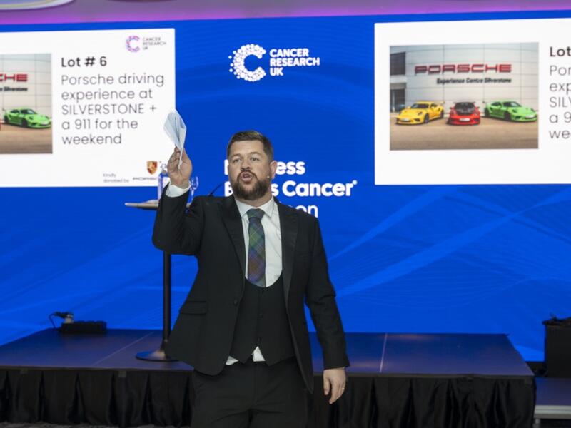 Presenter speaking at Business Beats Cancer Aberdeen event