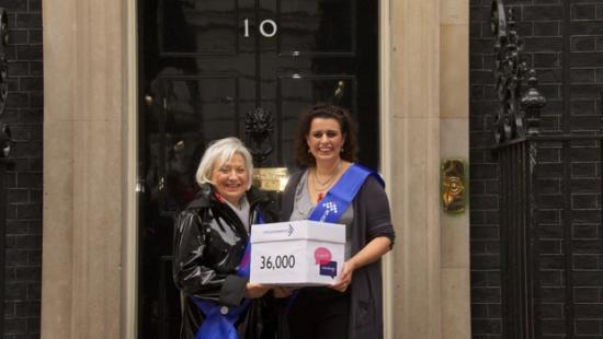 Two people outside 10 downing street