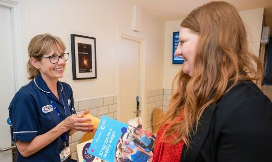 nurse with volunteer
