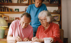 couple signing a will