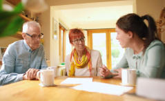 couple signing a will