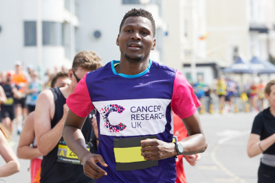 Man running for Cancer Research UK