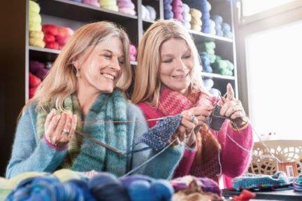 Two women knitting