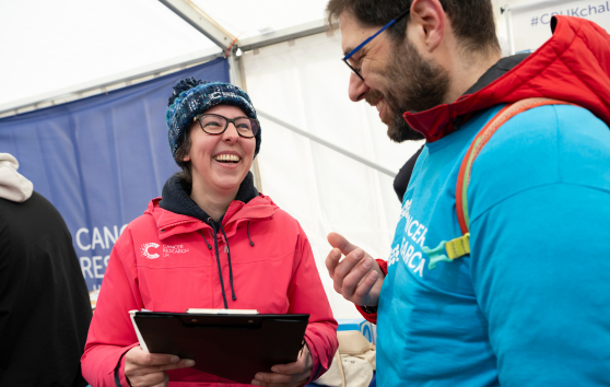 Two people chatting and smiling