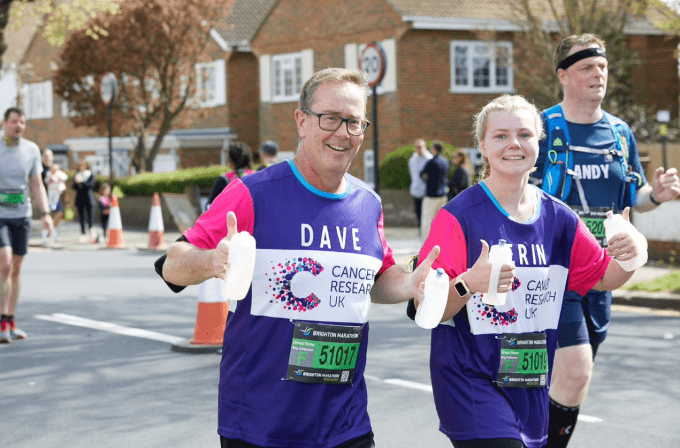 Man smiling whilst running