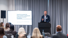 Speaker from Cancer Research UK at a conference