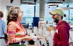 A photo of two Cancer Research UK Insights Panel members talking