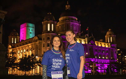 Two women smiling at the camera at Liverpool Shine Night Walk