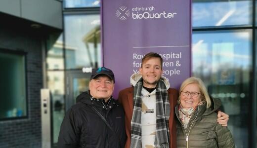 Nic with his parents