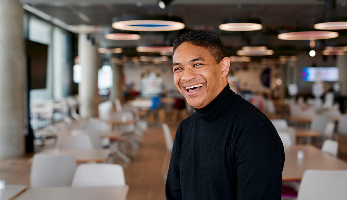 Photo of a person in the office smiling