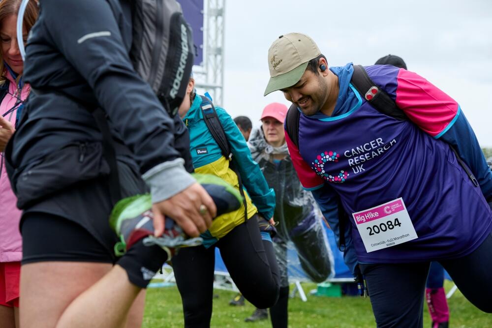 A Big Hike participant stretching his legs  A Big Hike participant stretching his legs