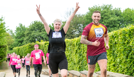 A photo of two happy runners