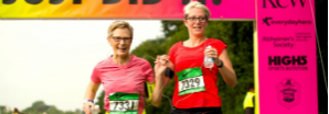 Two Cancer Research UK Runners finishing the Richmond RunFest Half Marathon