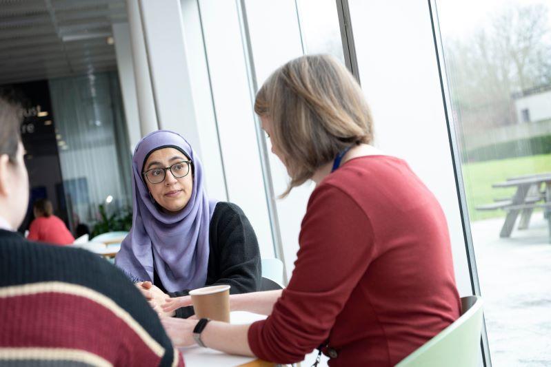 Researchers talking together