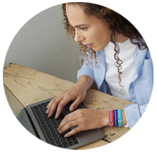 Woman typing on laptop